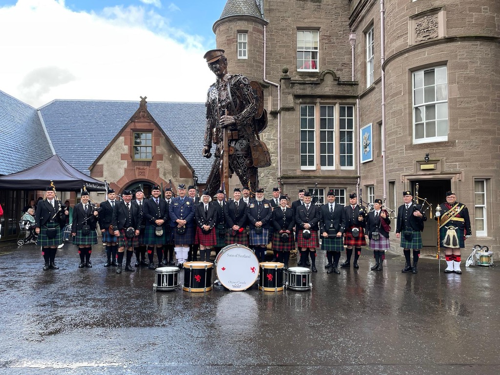 Matty Taylor playing bagpipes with the Sons of Scotland bagpipe band at the Black Watch Regimental Museum in Perth, Scotland