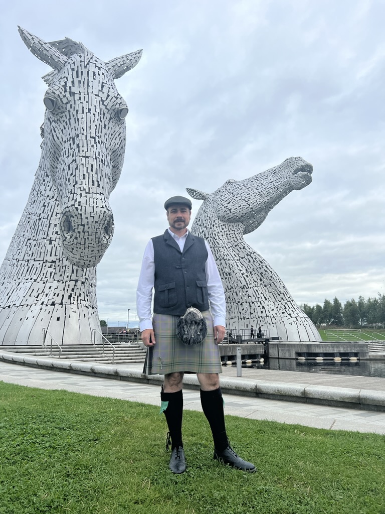 Matty Taylor in front of the Kelpies in Falkirk, Scotland